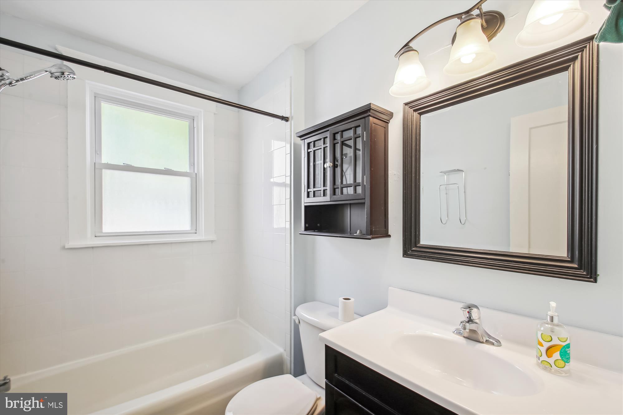 611 Clark Avenue Deale, MD 20751 - Photo 10 of 37 a bathroom with a sink and a bathtub