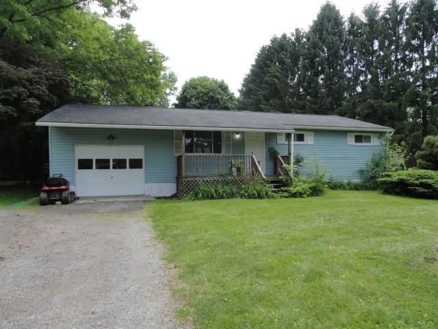 121 North Ridge Road Butler, PA 16001 - Photo 1 of 13 a house with trees in the background