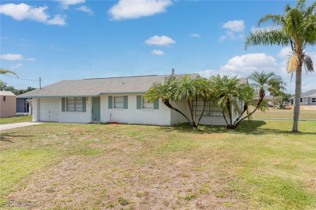 2019 Clark Avenue Fort Myers, FL 33905 - Photo 17 of 23 a view of a house with backyard and plants