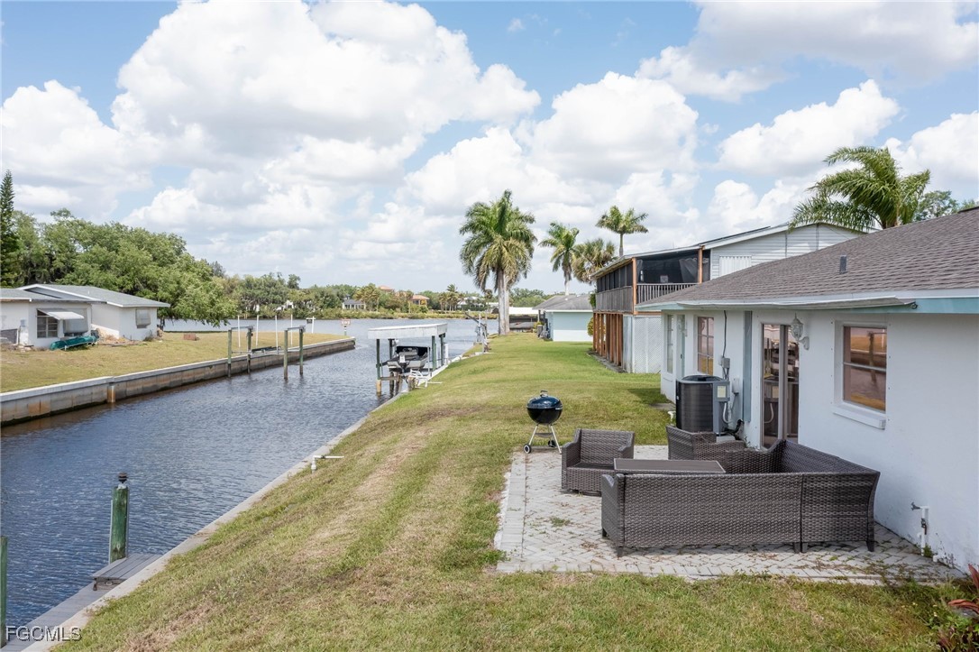 2019 Clark Avenue Fort Myers, FL 33905 - Photo 19 of 23 a view of a swimming pool and lounge chair