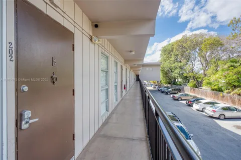 a hallway with dining room and livingroom view