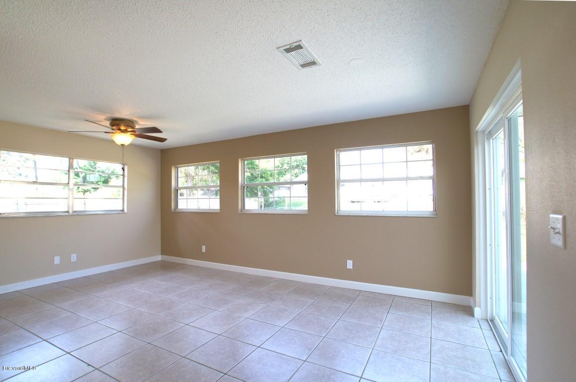 6450 Hudson Road Cocoa, FL 32927 - Photo 7 of 15 Hudson 6450-Family Room.jpg