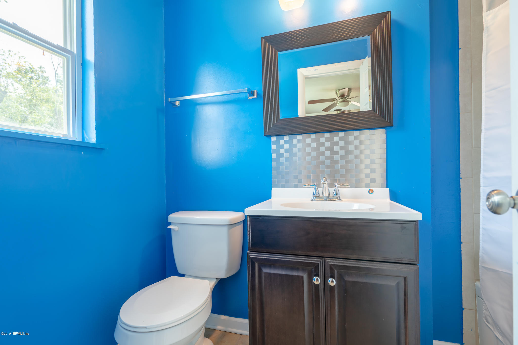 4519 Barnes Road South Jacksonville, FL 32207 - Photo 20 of 46 a bathroom with a sink and a toilet