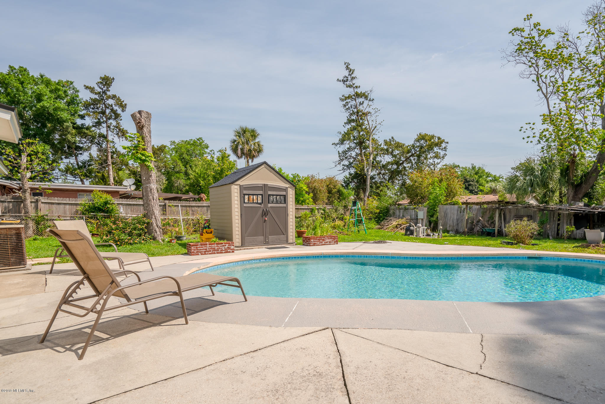 4519 Barnes Road South Jacksonville, FL 32207 - Photo 2 of 46 a view of a house with a yard and sitting area