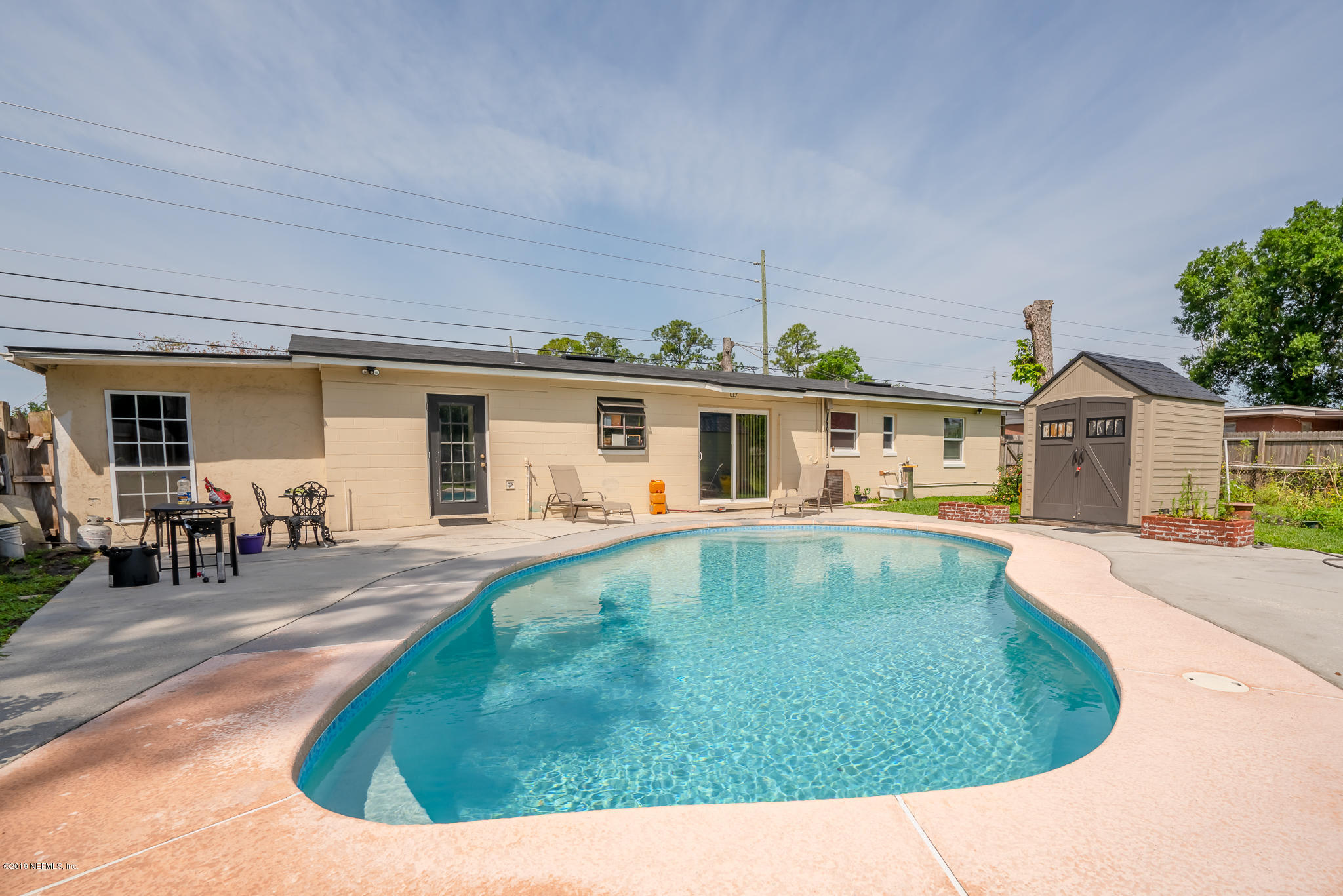 4519 Barnes Road South Jacksonville, FL 32207 - Photo 3 of 46 a view of a house with swimming pool and porch