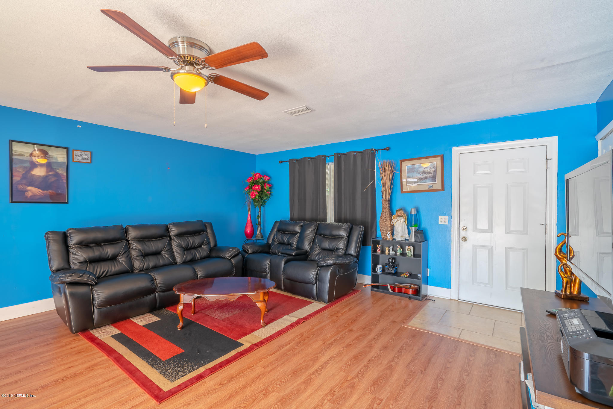 4519 Barnes Road South Jacksonville, FL 32207 - Photo 36 of 46 a living room with furniture and wooden floor