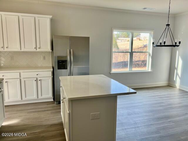 208 Trellis Walk Macon, GA 31220 - Photo 17 of 29 a kitchen with stainless steel appliances granite countertop a refrigerator a sink dishwasher and white cabinets with wooden floor