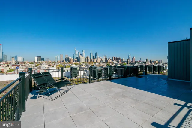 a view of a terrace with chairs