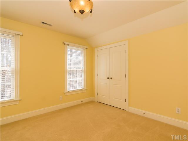 8677 Barrett Ridge Road Wake Forest, NC 27587 - Photo 16 of 25 Bedroom #2 is light and bright and has a spacious closet. Bedroom