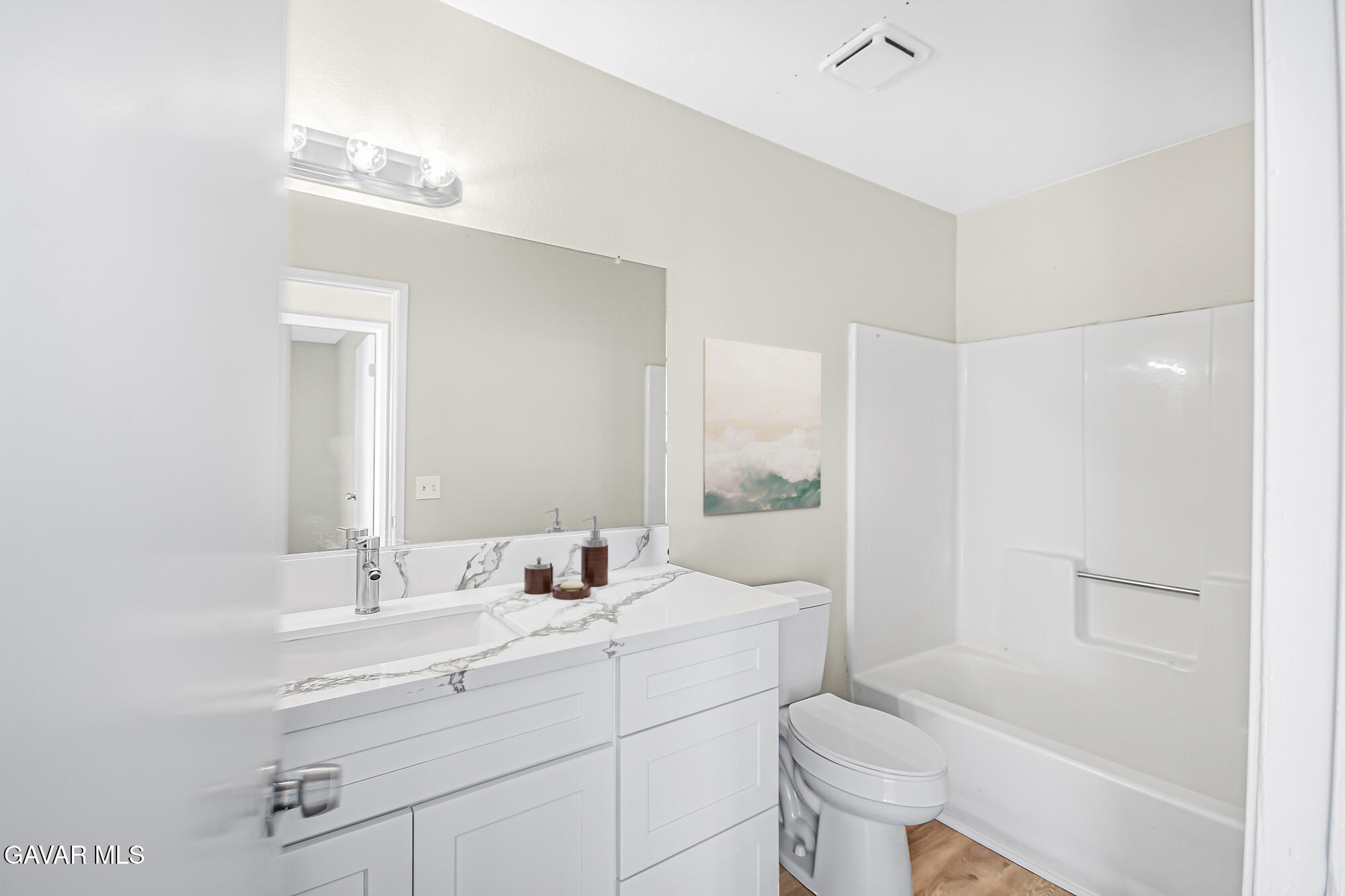 40523 172nd Street East Lancaster, CA 93535 - Photo 16 of 20 a bathroom with a sink toilet tub and shower