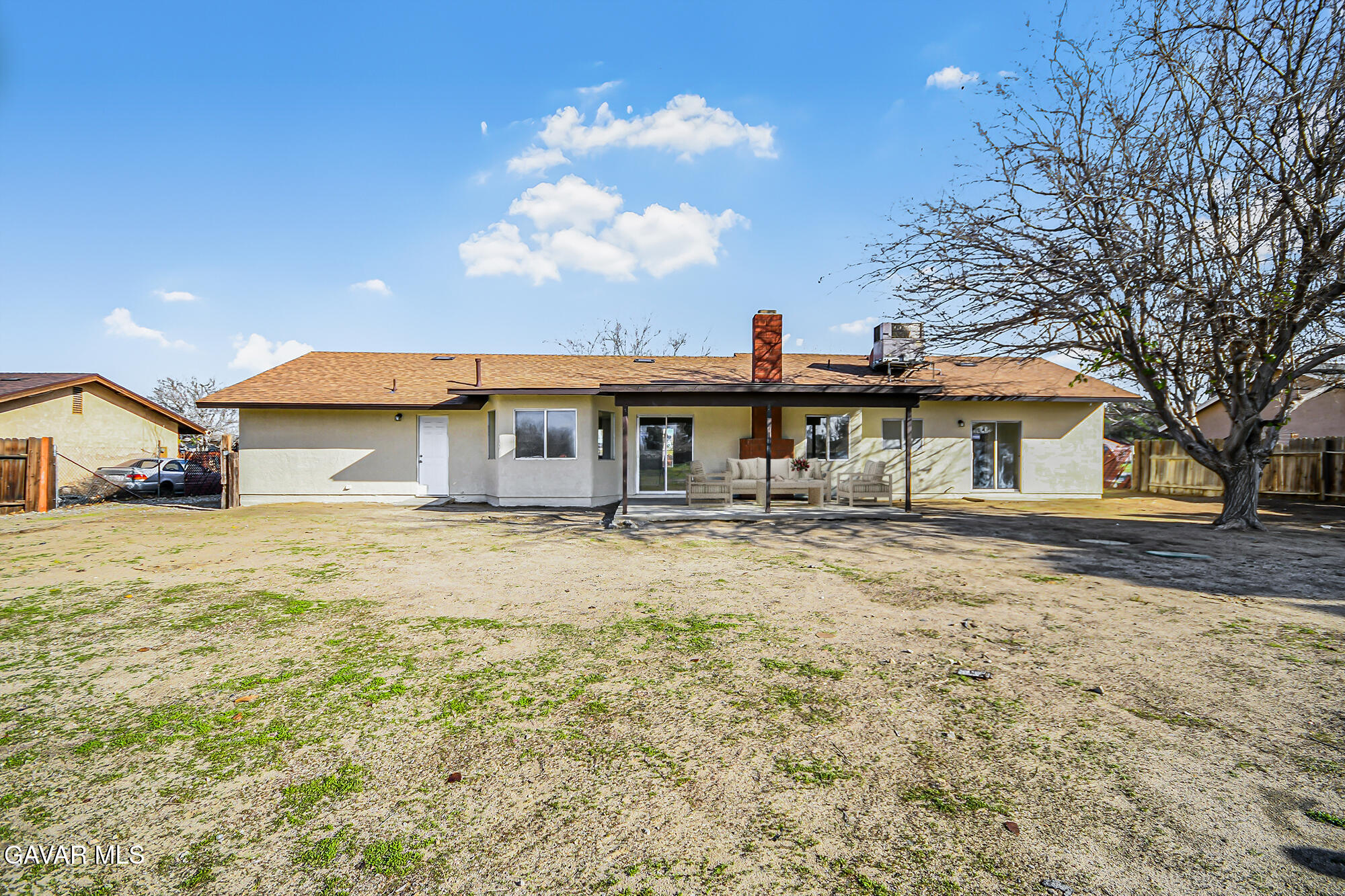 40523 172nd Street East Lancaster, CA 93535 - Photo 19 of 20 a front view of a house with a yard and garage