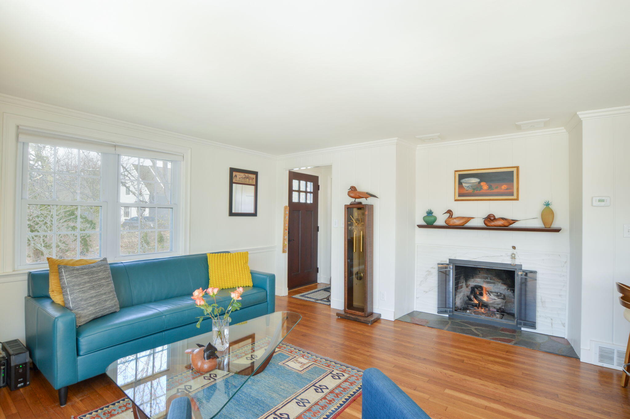 190 Pine Lane Osterville, MA 02655 - Photo 13 of 39 a living room with furniture and a fireplace