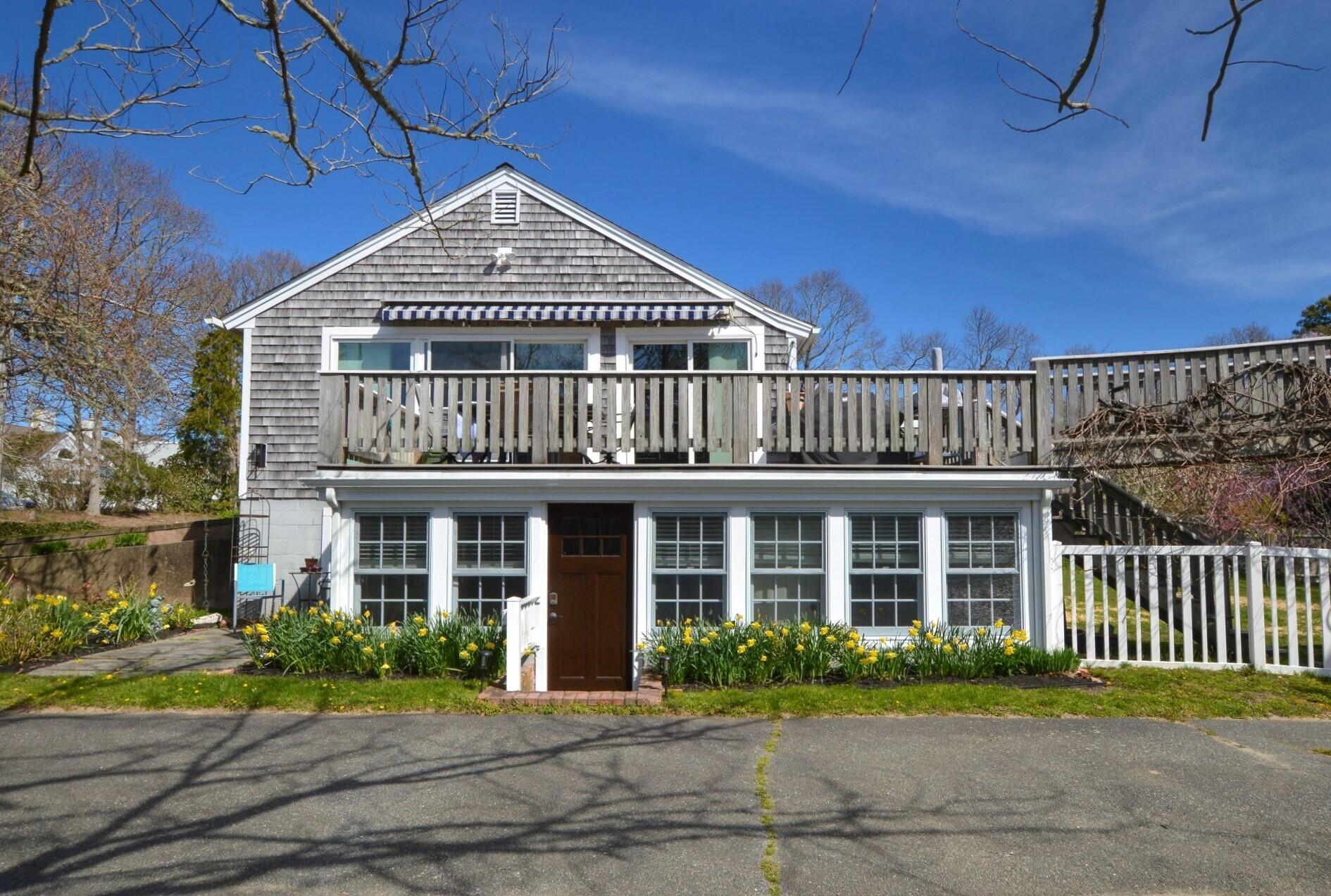 190 Pine Lane Osterville, MA 02655 - Photo 20 of 39 a front of a house with a yard