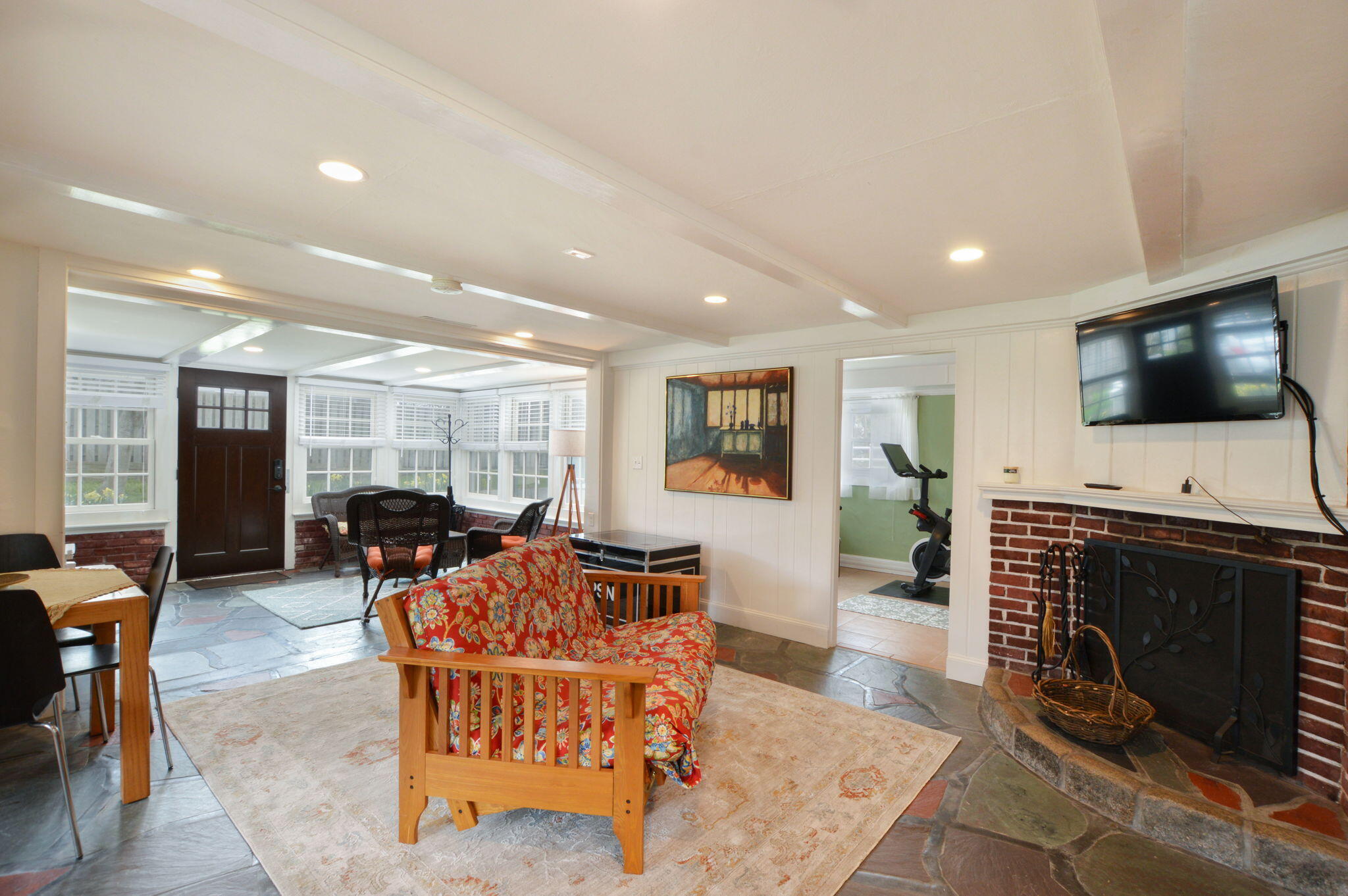 190 Pine Lane Osterville, MA 02655 - Photo 22 of 39 a living room with furniture a flat screen tv and a fireplace