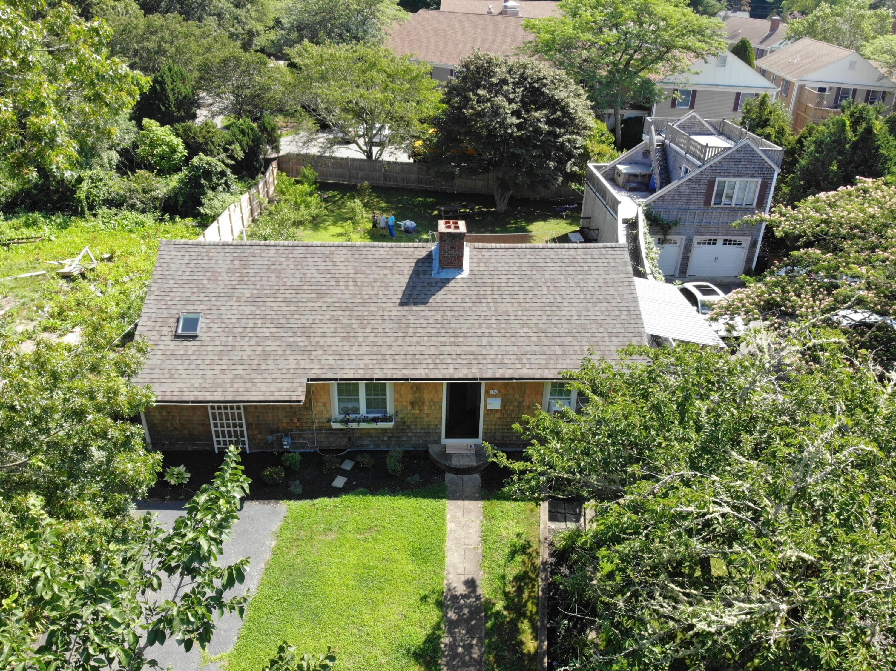 190 Pine Lane Osterville, MA 02655 - Photo 3 of 39 an aerial view of a house with swimming pool and garden