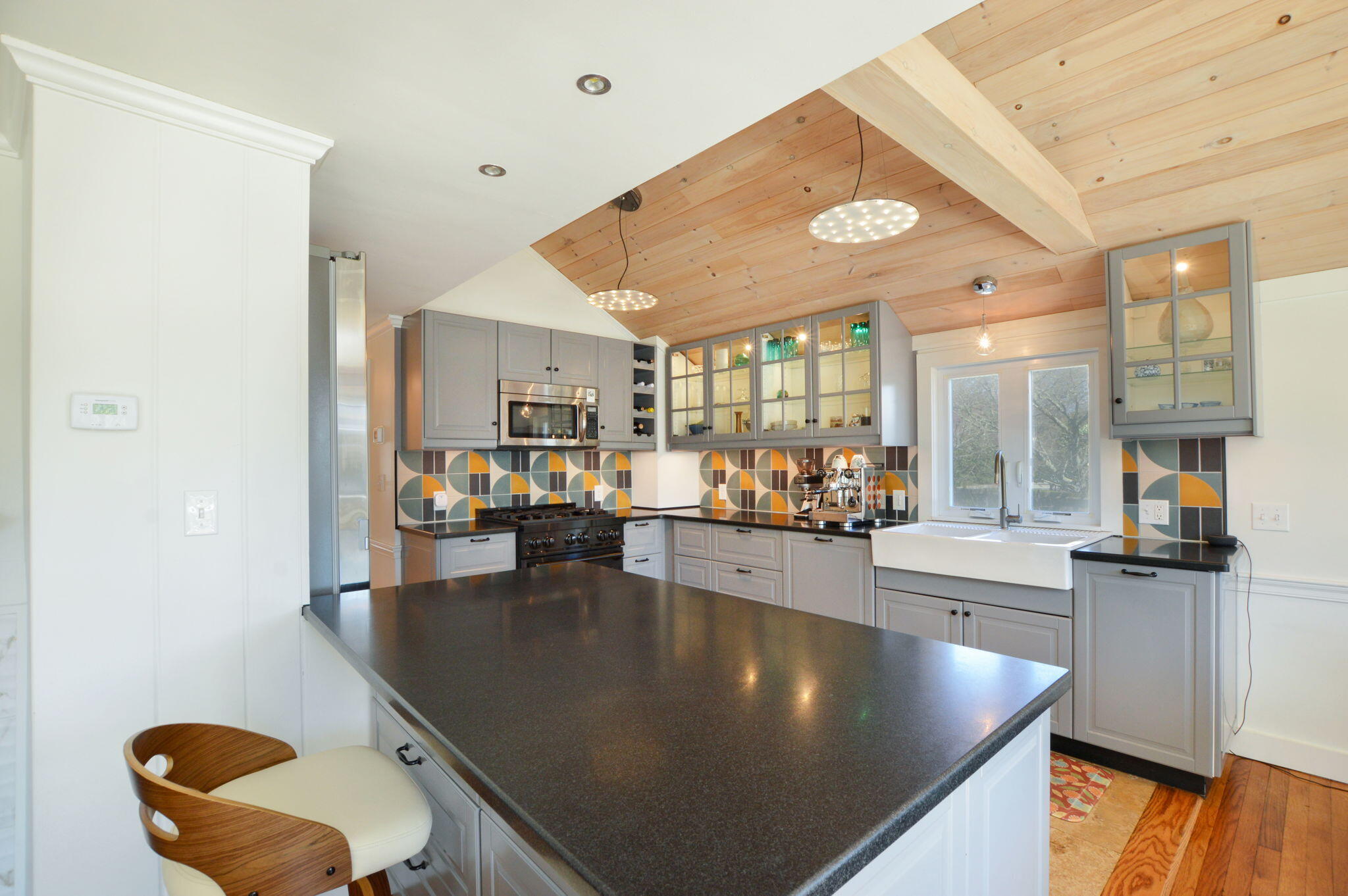 190 Pine Lane Osterville, MA 02655 - Photo 4 of 39 a kitchen with stainless steel appliances granite countertop a sink a stove and a refrigerator