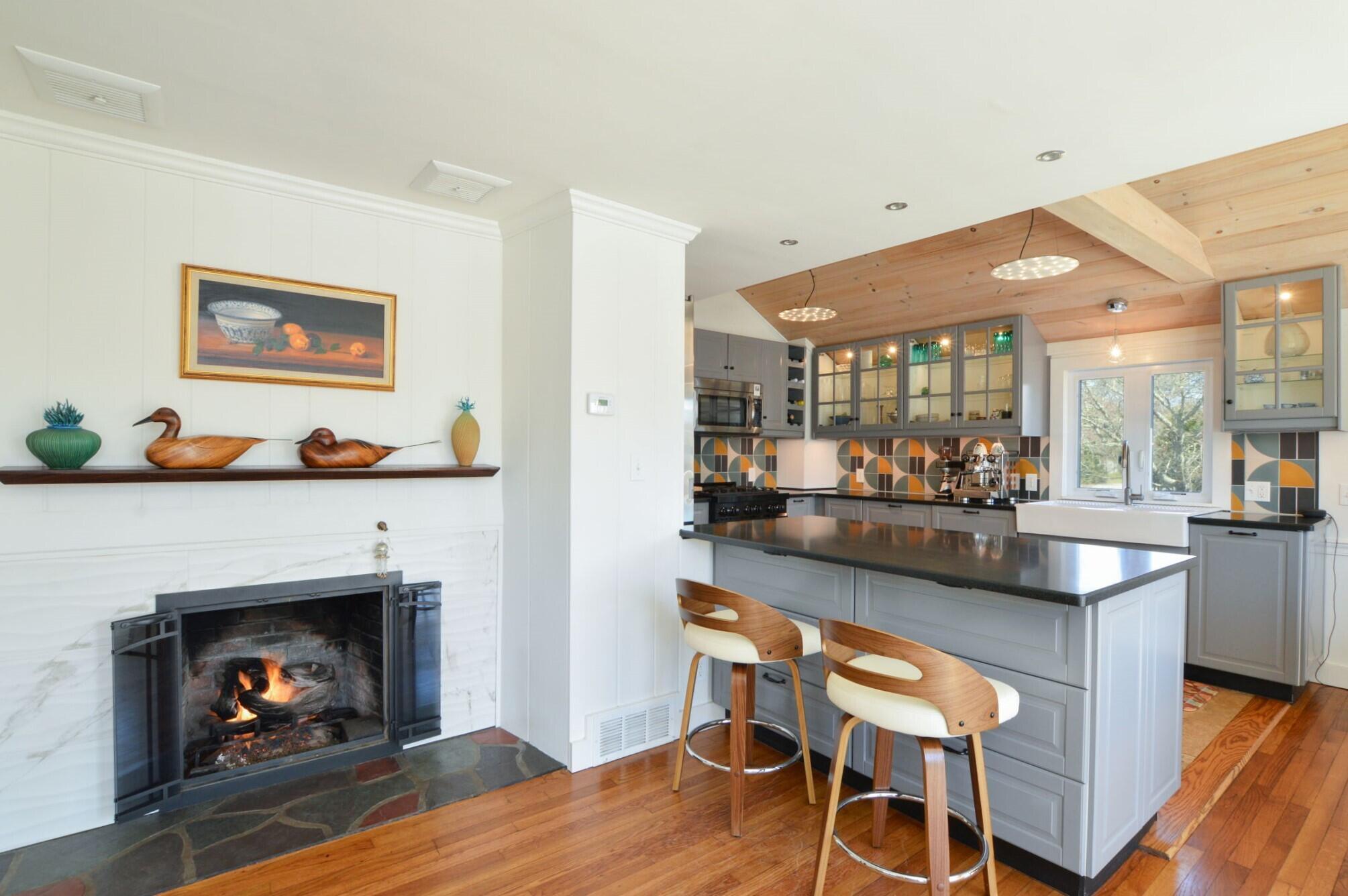 190 Pine Lane Osterville, MA 02655 - Photo 8 of 39 a living room with furniture and a fireplace