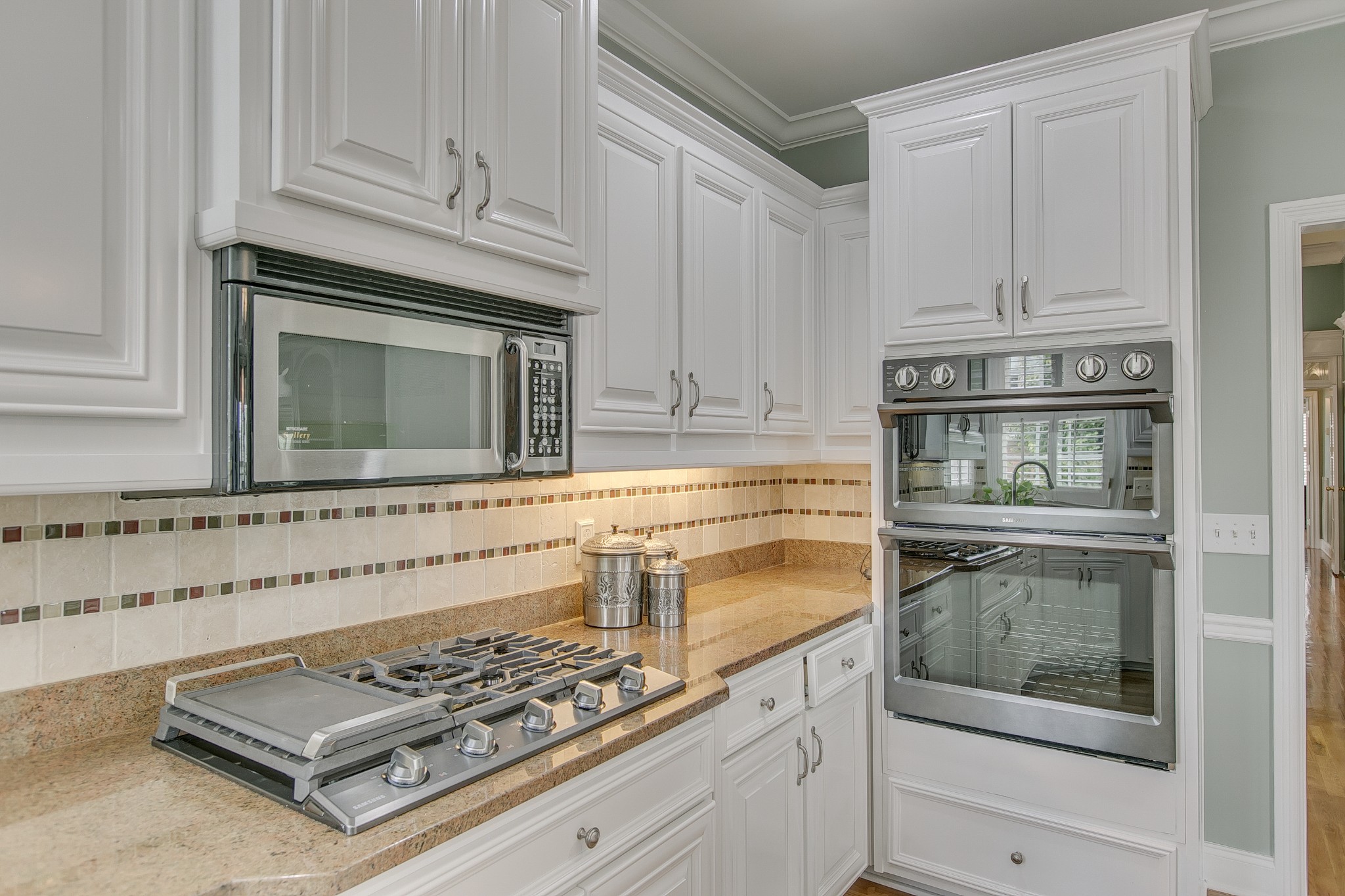 2613 Sequoya Trace Murfreesboro, TN 37127 - Photo 13 of 48 a kitchen with white cabinets and appliances