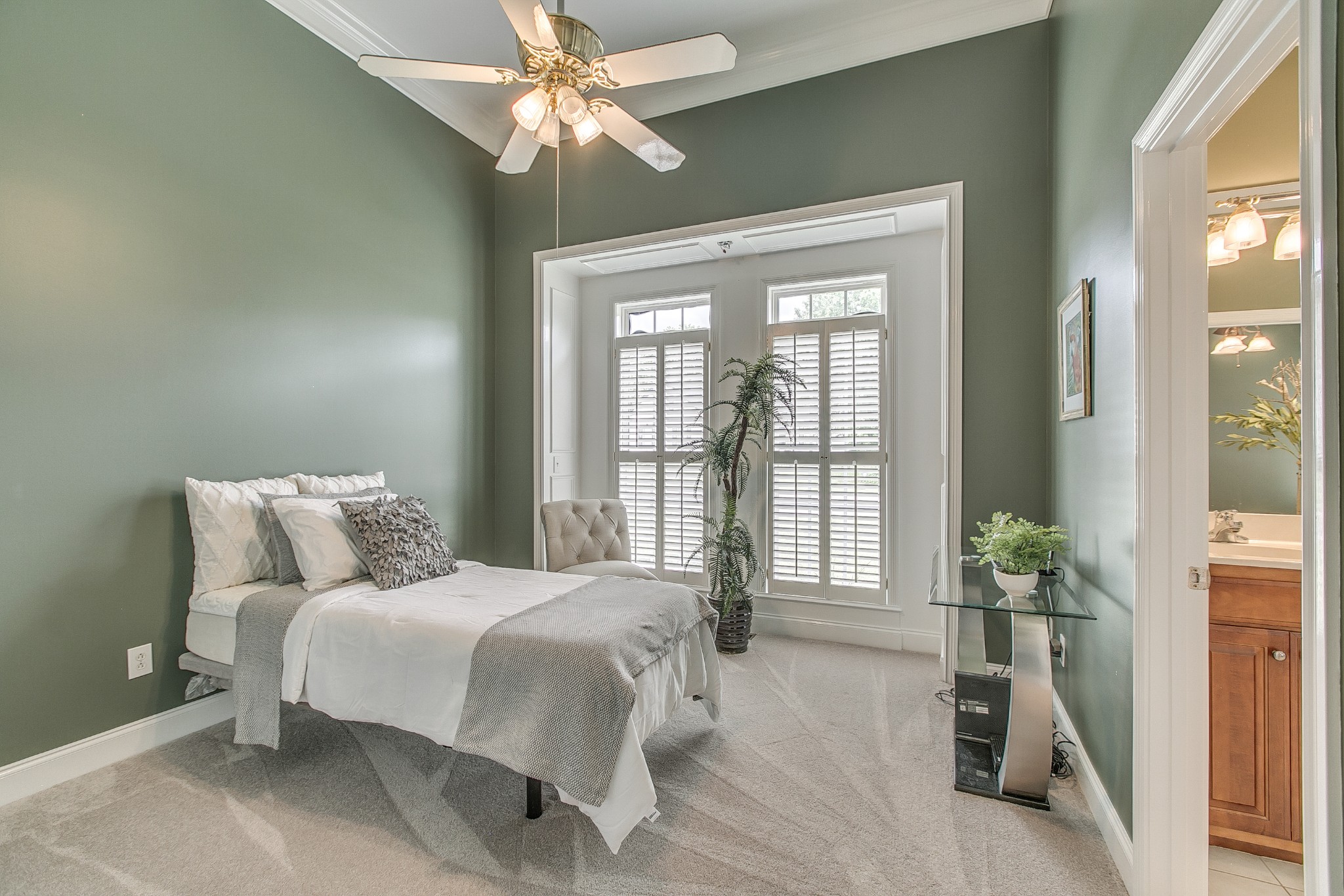 2613 Sequoya Trace Murfreesboro, TN 37127 - Photo 21 of 48 a bedroom with a large bed and a chandelier