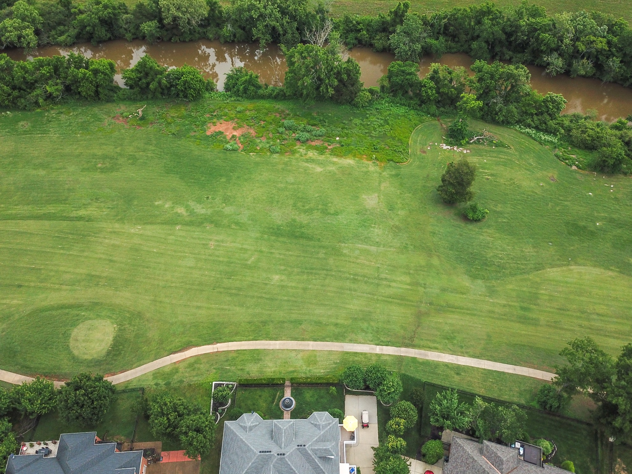 2613 Sequoya Trace Murfreesboro, TN 37127 - Photo 42 of 48 a backyard of a house with lots of green space and lake view