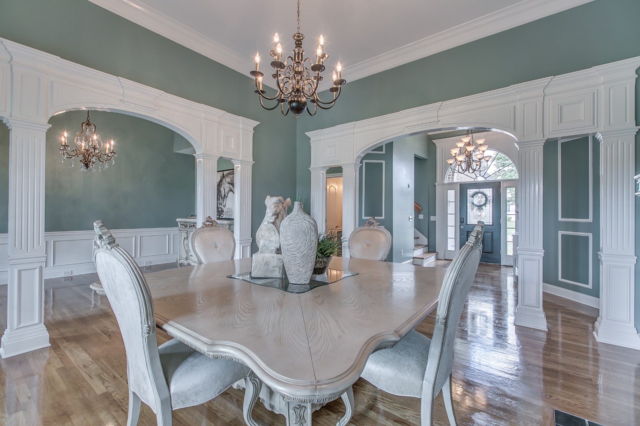 2613 Sequoya Trace Murfreesboro, TN 37127 - Photo 5 of 48 a dining room with furniture wooden floor a chandelier and a rug