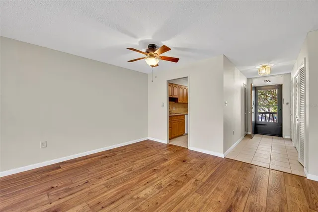 a view of an empty room with a window