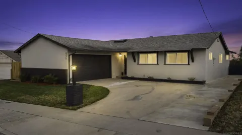 a house with yard in front of it