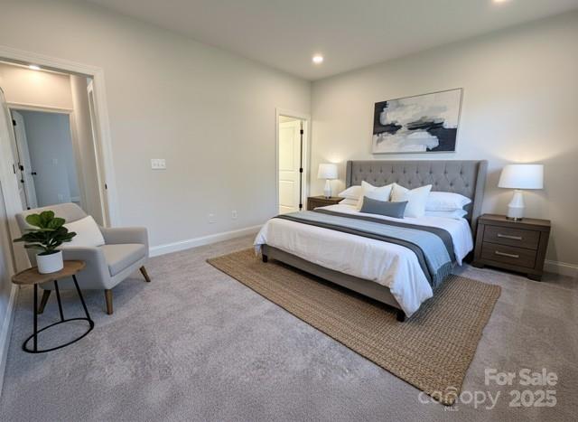 211 Queens Court Gastonia, NC 28052 - Photo 40 of 48 a bedroom with a bed and a chair