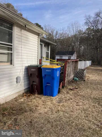 a view of backyard with deck