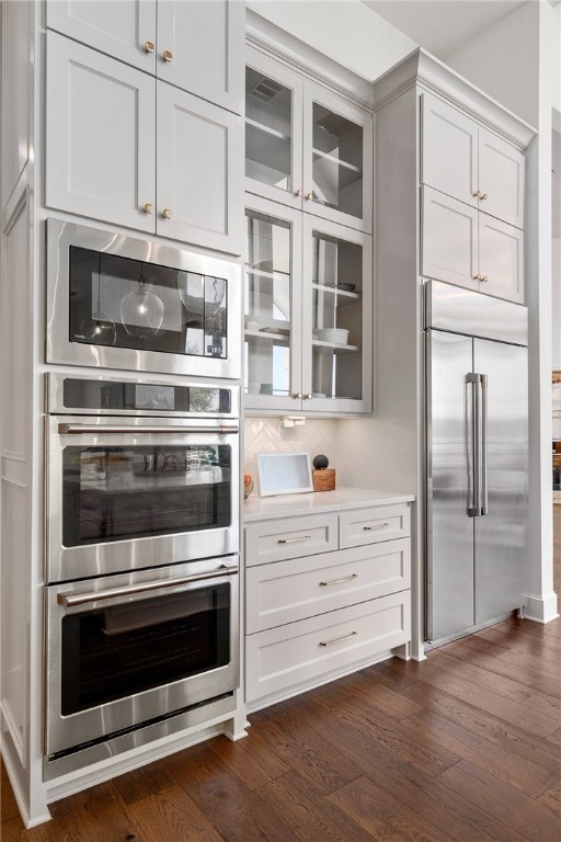 1351 River Road Waco, TX 76705 - Photo 18 of 96 a kitchen with granite countertop white cabinets and stainless steel appliances