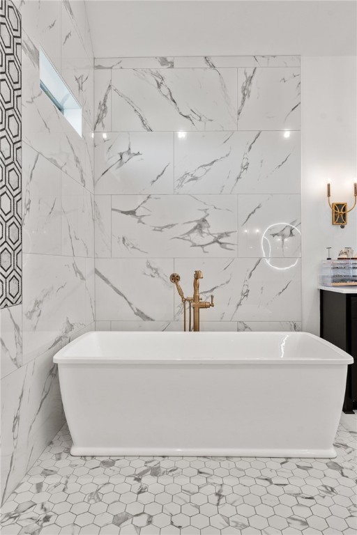 1351 River Road Waco, TX 76705 - Photo 28 of 96 a white bath tub sitting in a bathroom