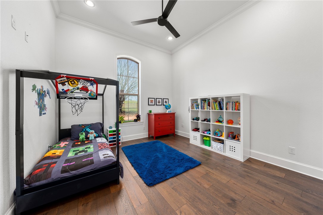 1351 River Road Waco, TX 76705 - Photo 34 of 96 a living room with furniture and a book shelf