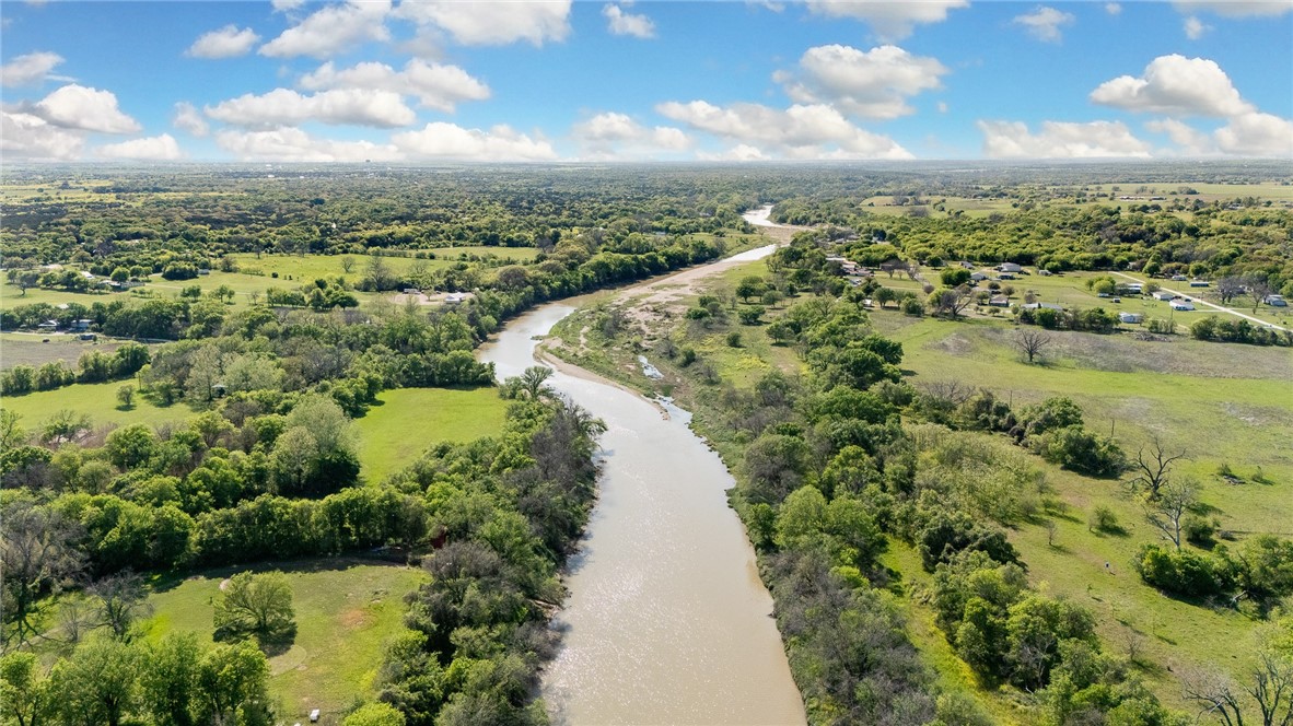 1351 River Road Waco, TX 76705 - Photo 4 of 96 a view of a lake with a city