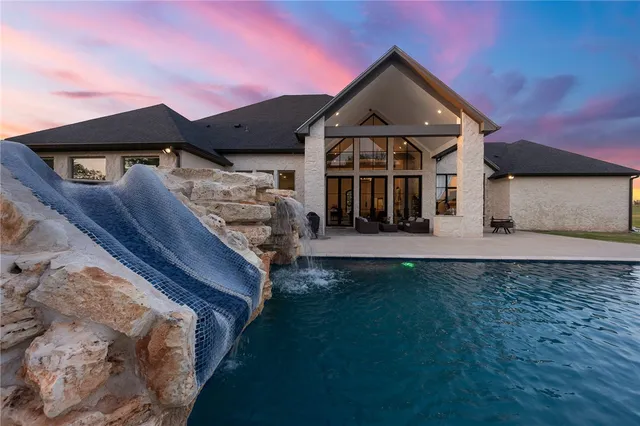 a view of a lake with a yard