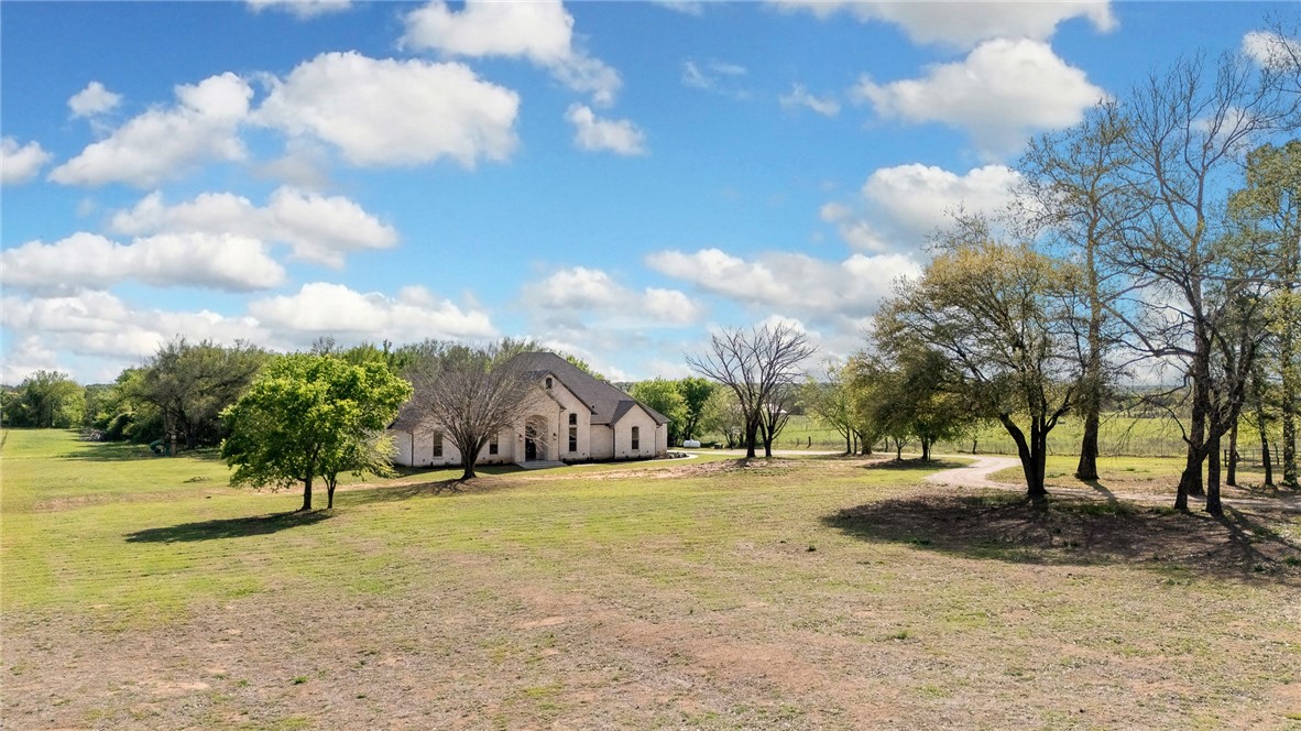 1351 River Road Waco, TX 76705 - Photo 74 of 96 a view of yard with tree in the background