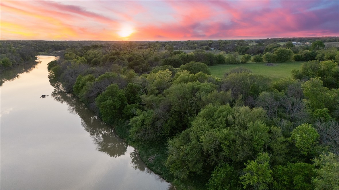 1351 River Road Waco, TX 76705 - Photo 87 of 96 a view of a lake with a yard