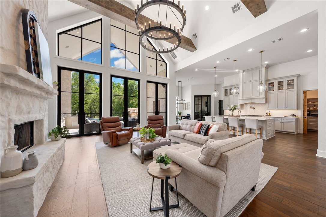 1351 River Road Waco, TX 76705 - Photo 10 of 96 a living room with furniture or fireplace and a chandelier