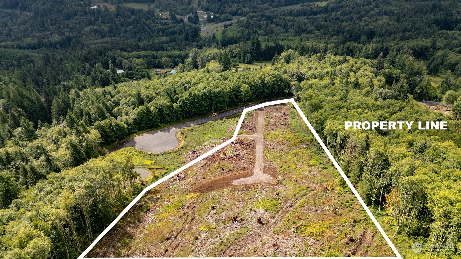 347 Short Road Morton, WA 98356 - Photo 14 of 16 a view of a swimming pool with a garden