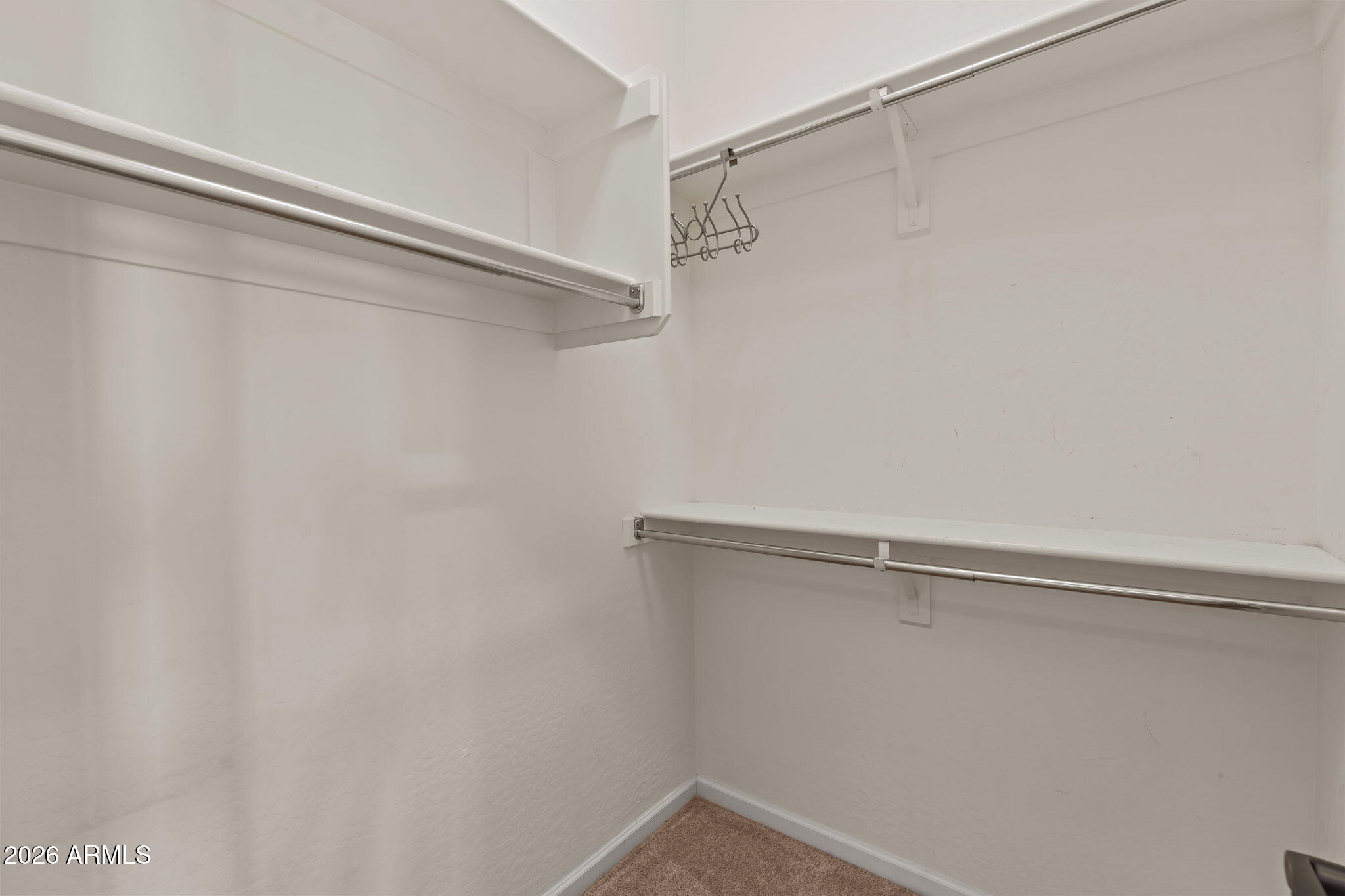 3675 Gold Ridge Road Wickenburg, AZ 85390 - Photo 25 of 58 a view of a room with racks on the wall