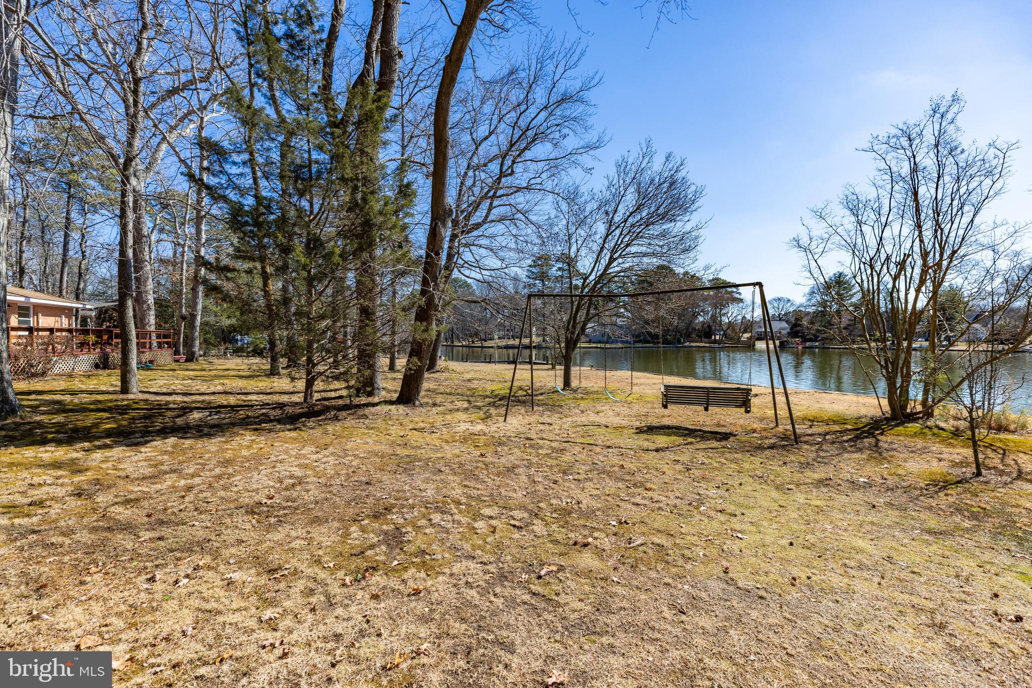 31360 Point Circle Lewes, DE 19958 - Photo 38 of 42 a view of a yard with a house