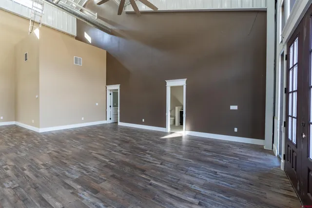 a view of a livingroom with wooden floor