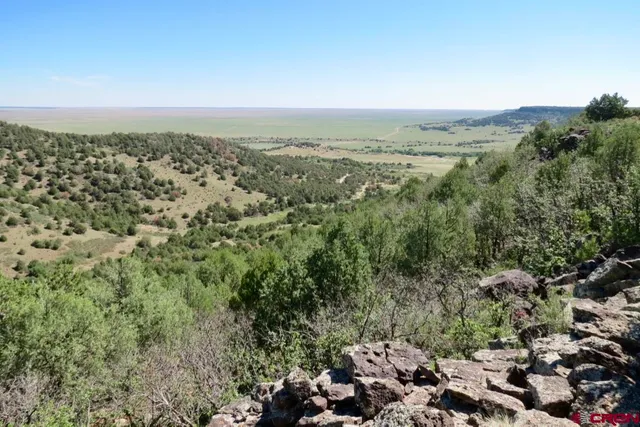 a view of a lake with beach and ocean view