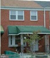 934 Arncliffe Road Baltimore, MD 21221 - Photo 1 of 5 a front view of a house with garden