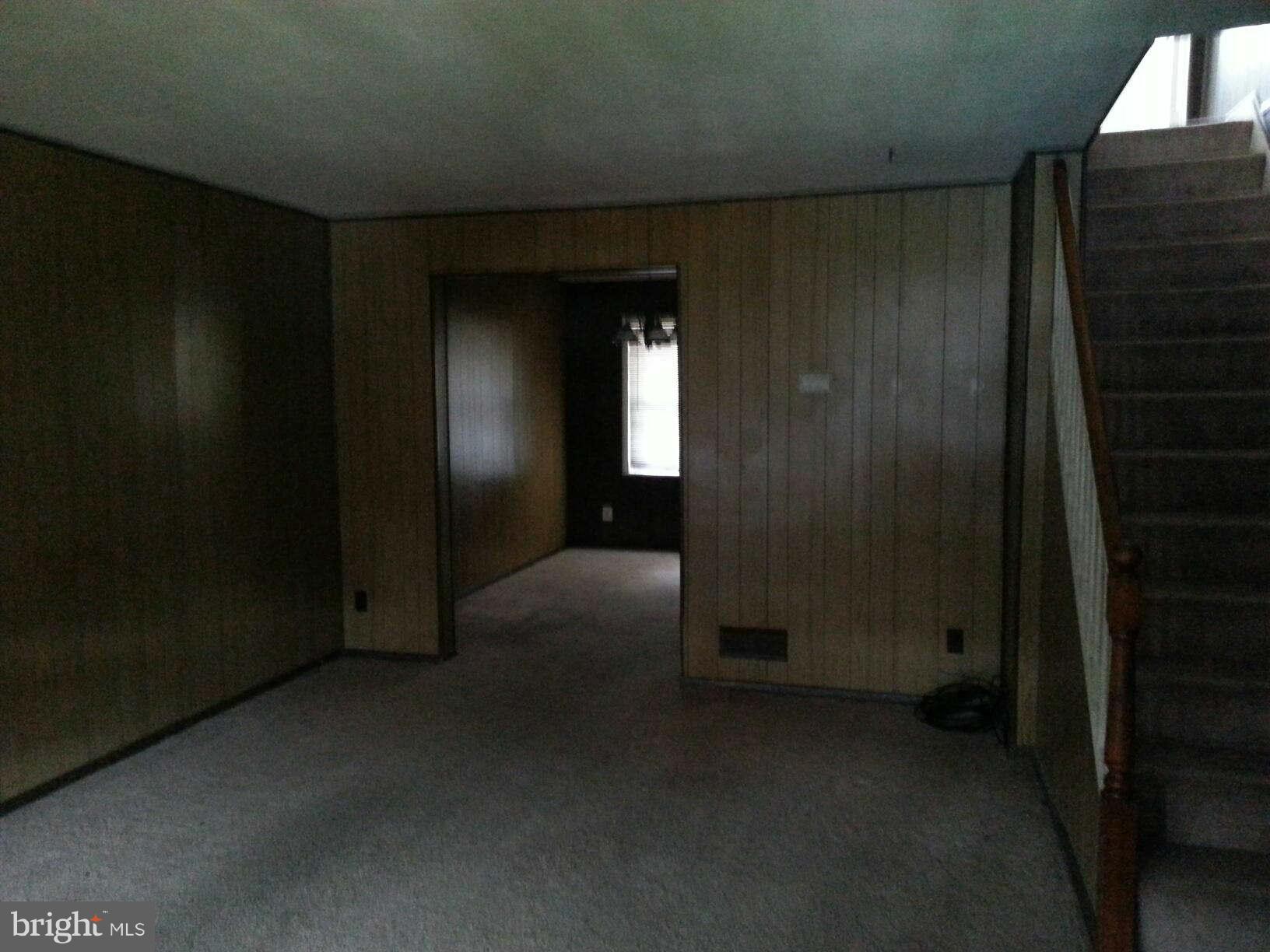 934 Arncliffe Road Baltimore, MD 21221 - Photo 4 of 5 a view of hallway with window