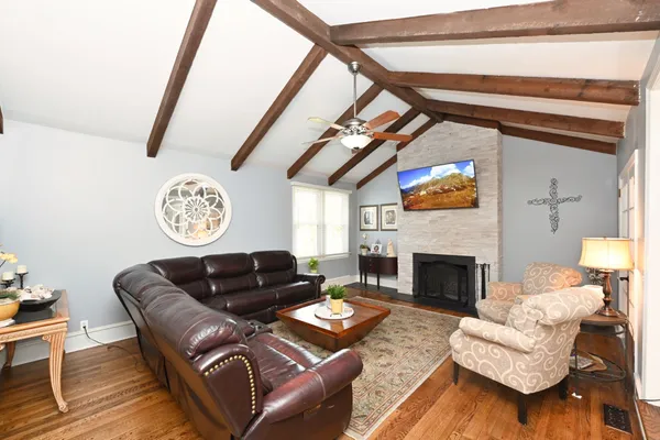 a living room with furniture and a window