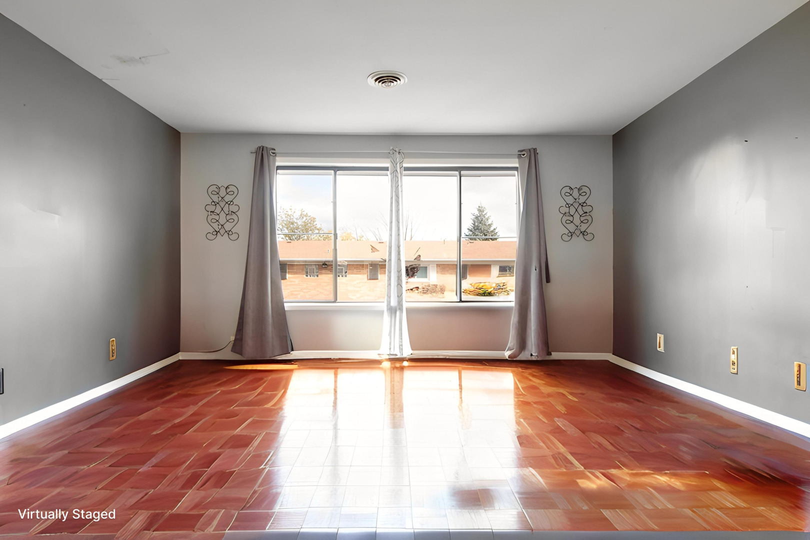310 George Street, Unit 2SE Bensenville, IL 60106 - Photo 5 of 11 a view of an empty room with wooden floor and a window
