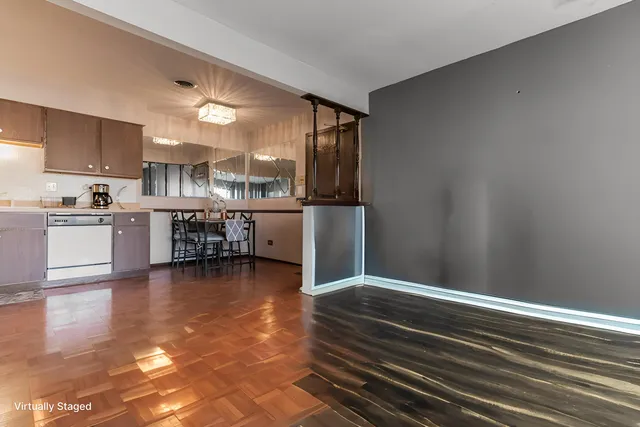 a kitchen with stainless steel appliances a refrigerator and cabinets
