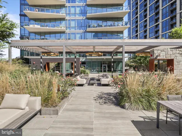 a view of a building with sitting area