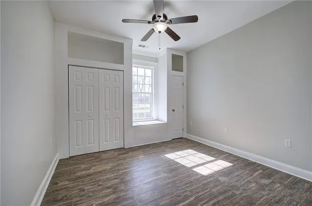 a view of an empty room and window