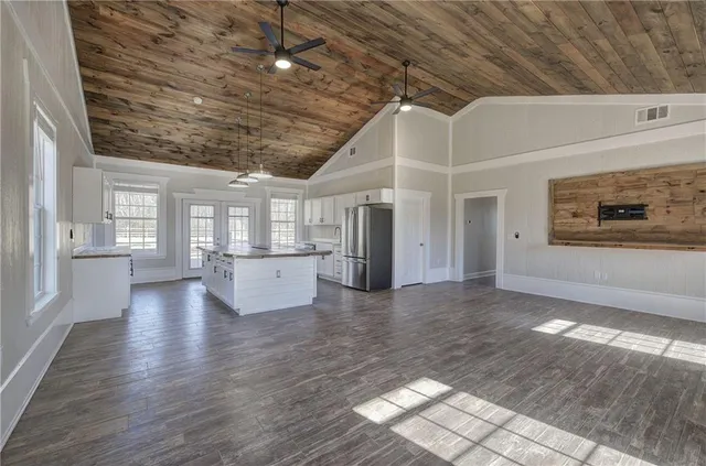 a view of a livingroom with wooden floor
